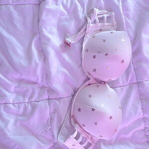 A white sea star themed swim top